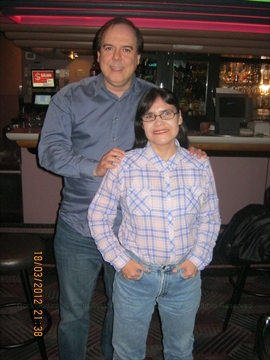 Paul The Rock God posing closely with Suzanna