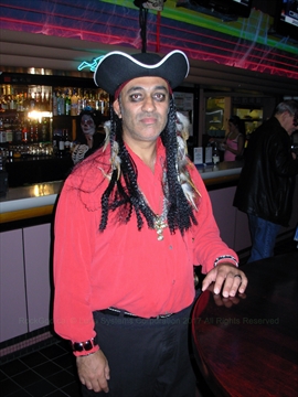 Paul the Rock God performing live on stage in a Halloween costume
